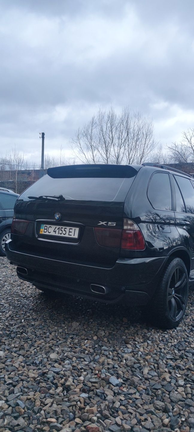 BMW x5 e53 2004р.рест 4.4 газ-бенз чорний на білому