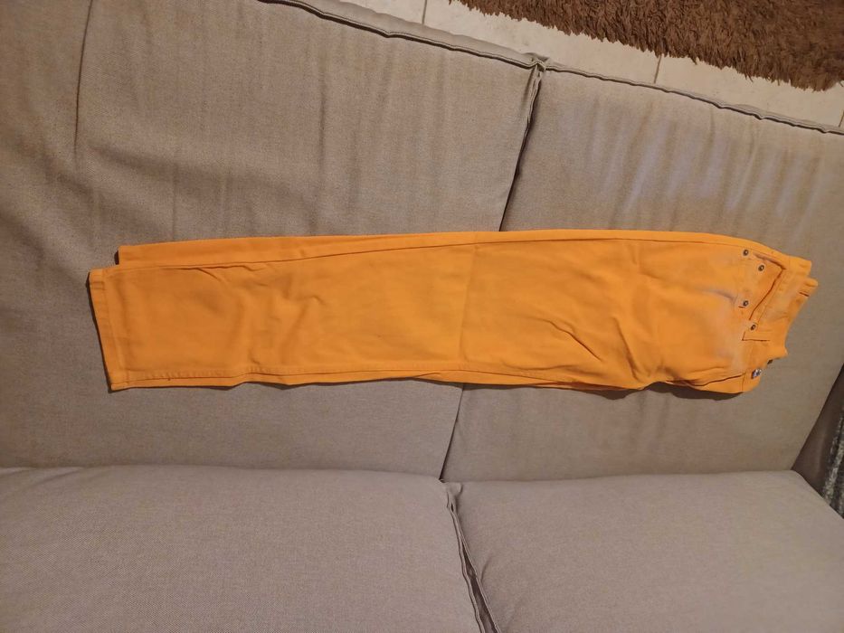 Calças Benetton cor de laranja