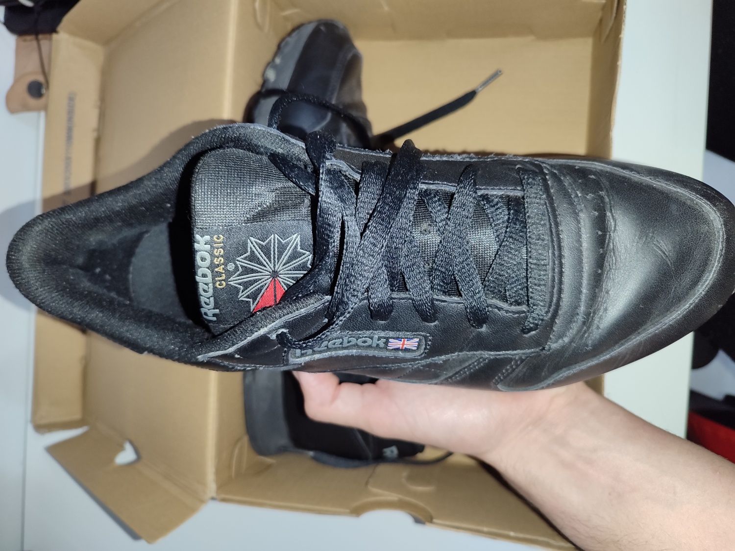 Reebok black unisexo