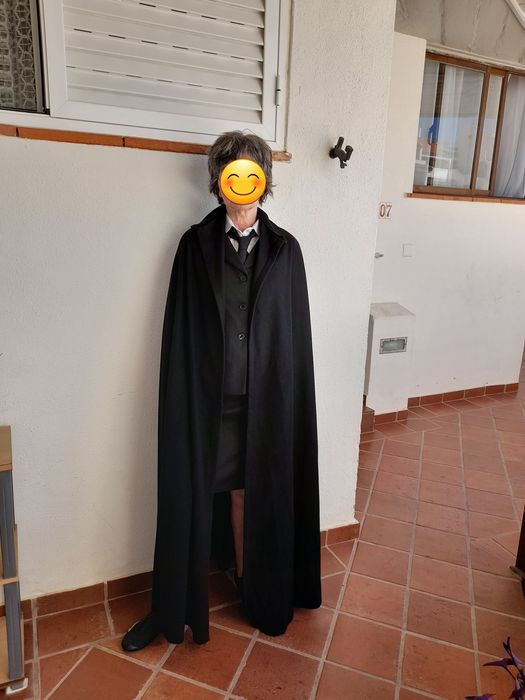 Traje académico para senhora.