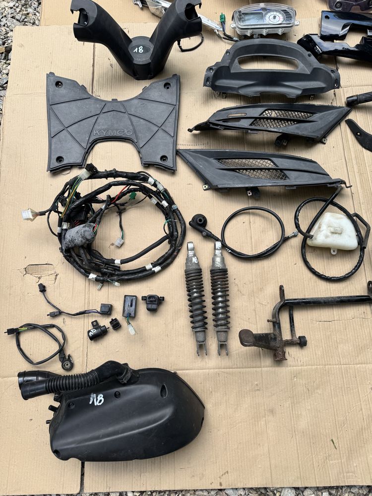 Kymco Dink 200 200i owiewka lampa szyba licznik tarcza nosek części