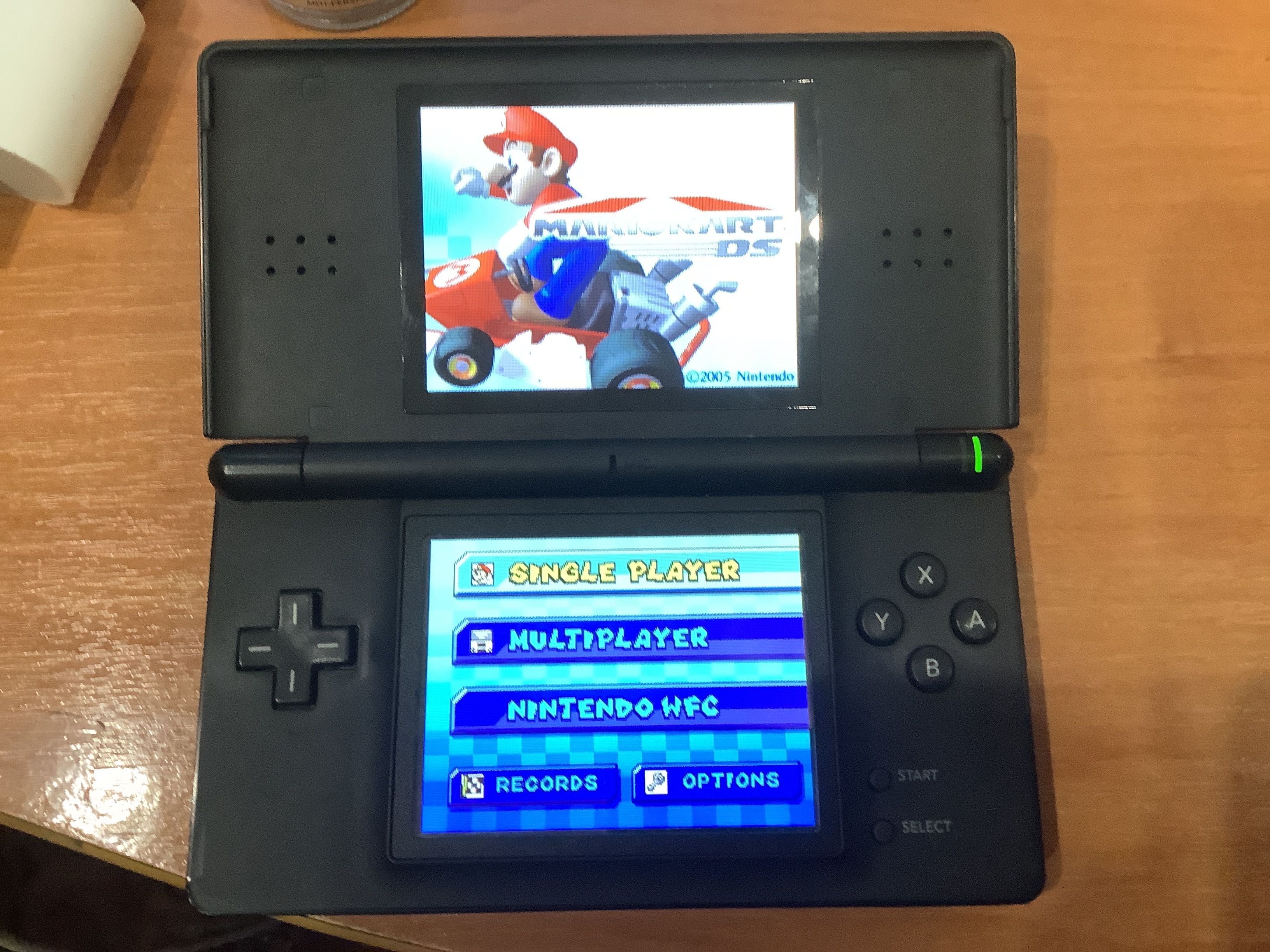 Nintendo DS Lite+флеш-карта (R4) + игра NFS+зарядка предлагайте цену