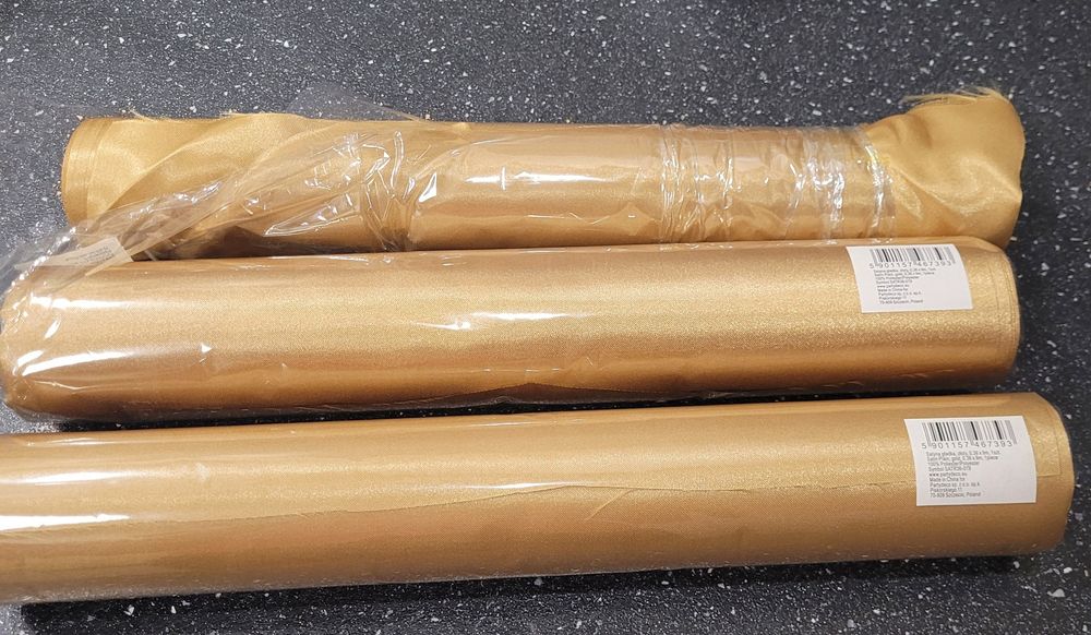 Sprzedam materiał ozdobny- satyna gładka,złota