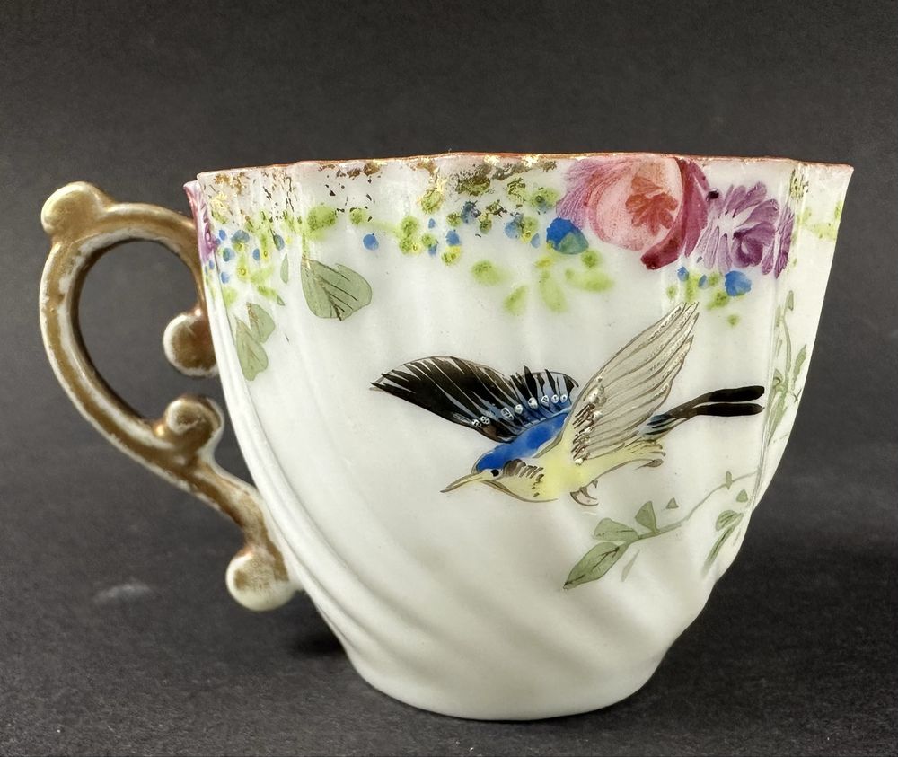 Filiżanka ze spodkiem ptak cieniutka porcelana filiżanki kwiaty