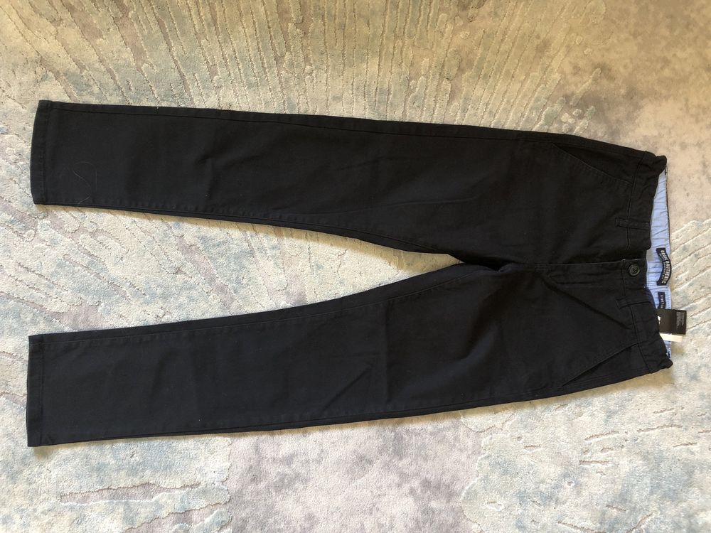 Spodnie bawełniane slim H and M 152