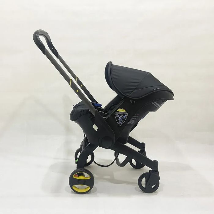 Дитяча Коляска - автокрісло з колесами 4 в 1