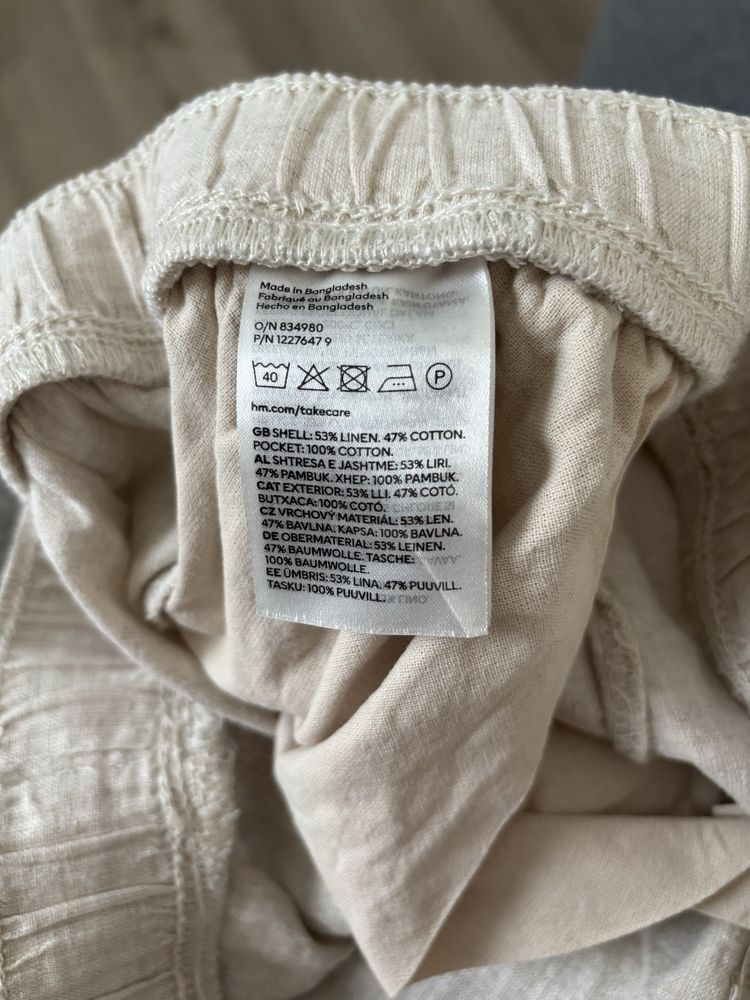 Spodnue damskie beż len H/M cargo S
