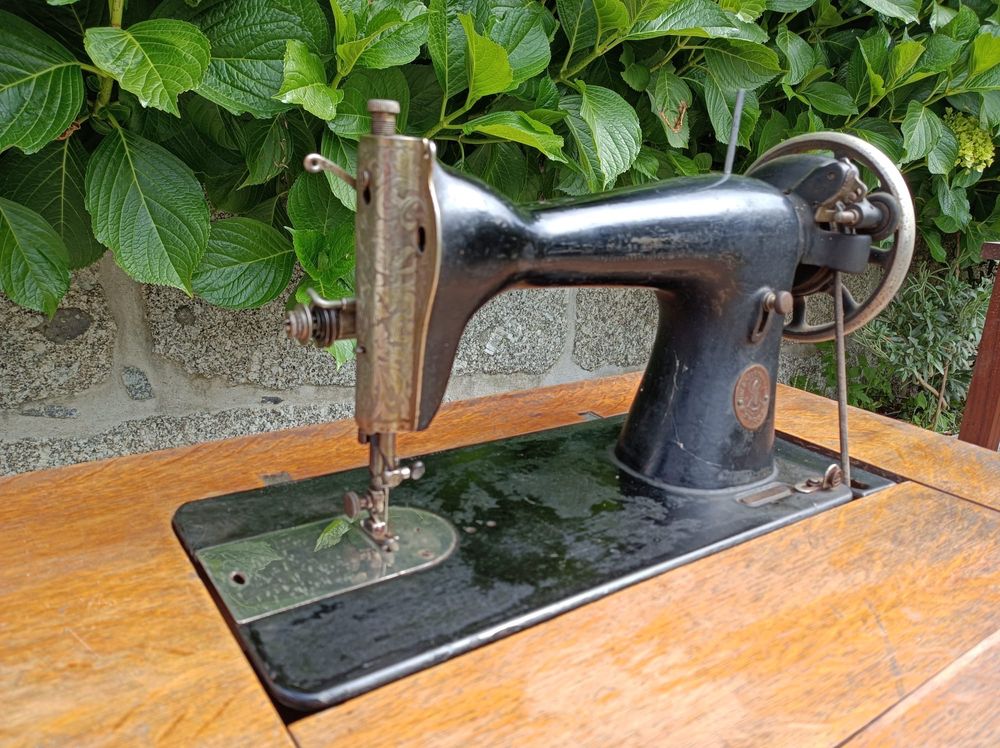 Maquina de costura singer