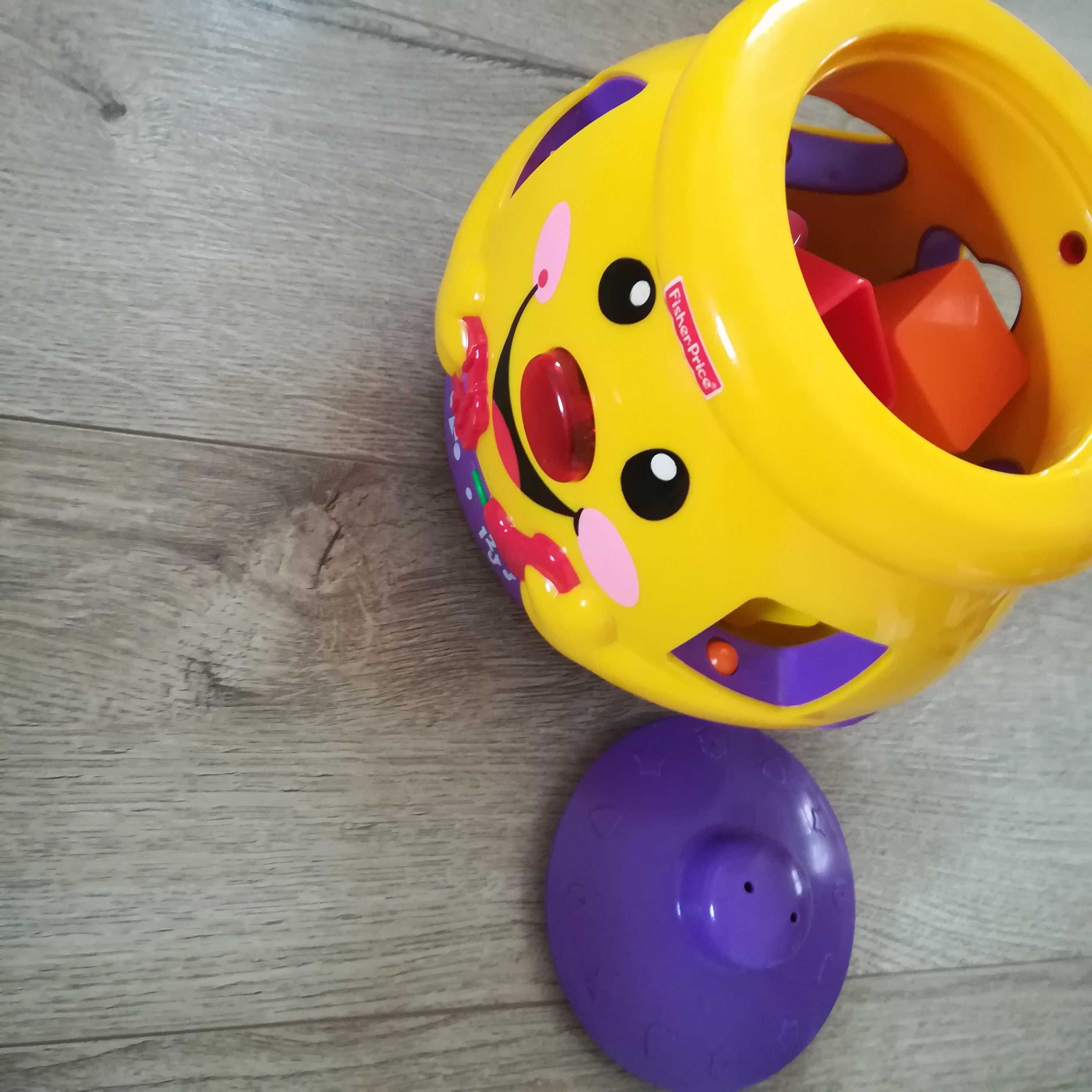 Garnuszek na klocuszek Fisher price