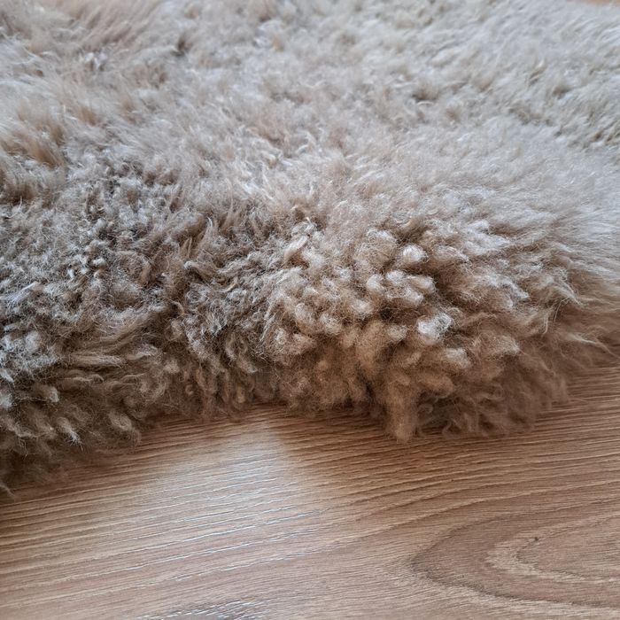 Коврик Ikea,  овечья шкура, овчина 1метр× 55 см  практически новый.