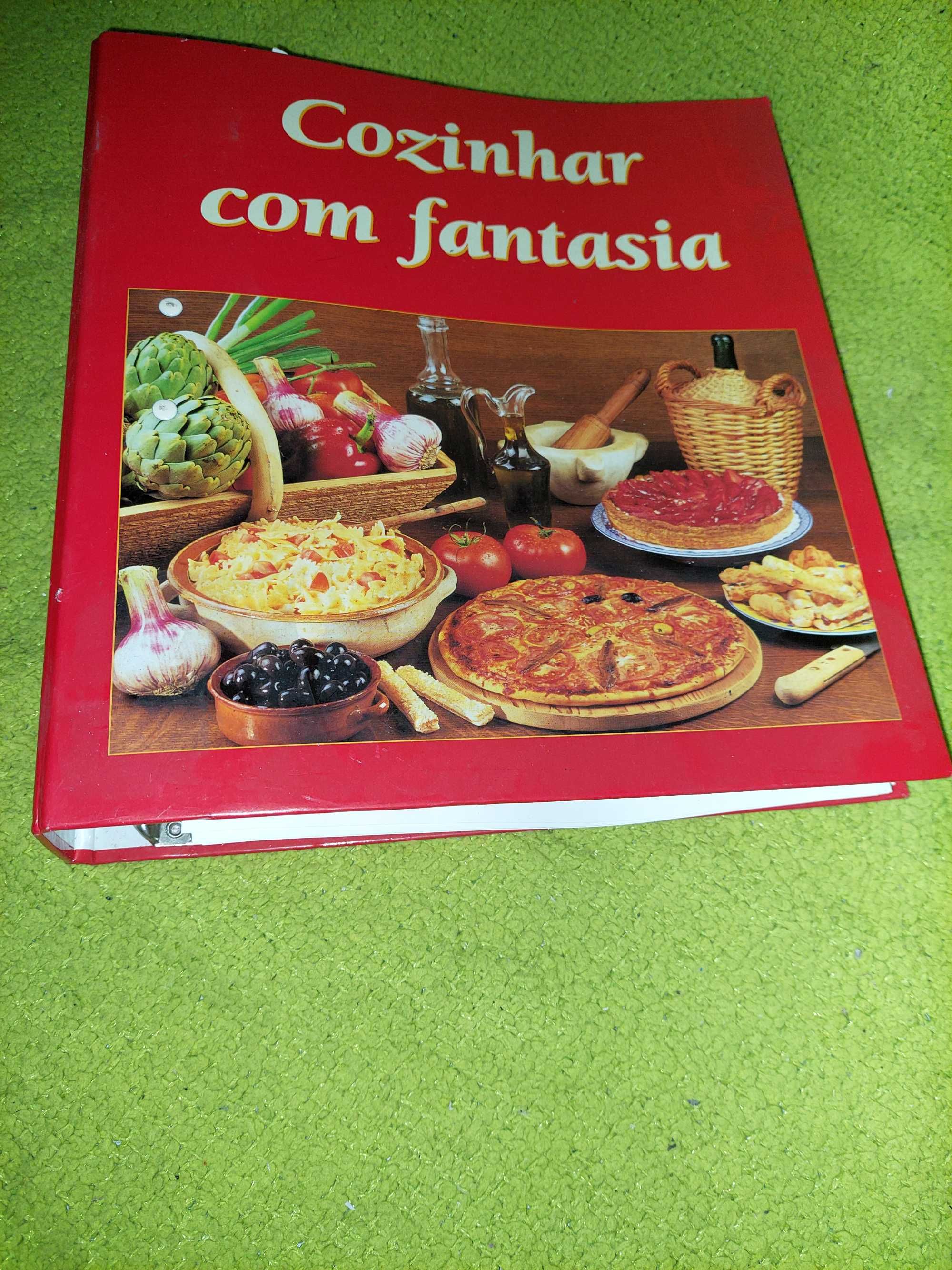 Diversos livros  incluindo uma coleção de receitas de cozinha