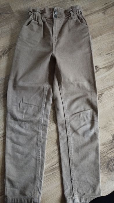 Spodnie jeansy brązowe 140 146 szerokie