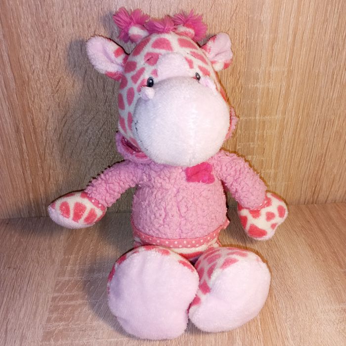 Рожевий,милий жираф