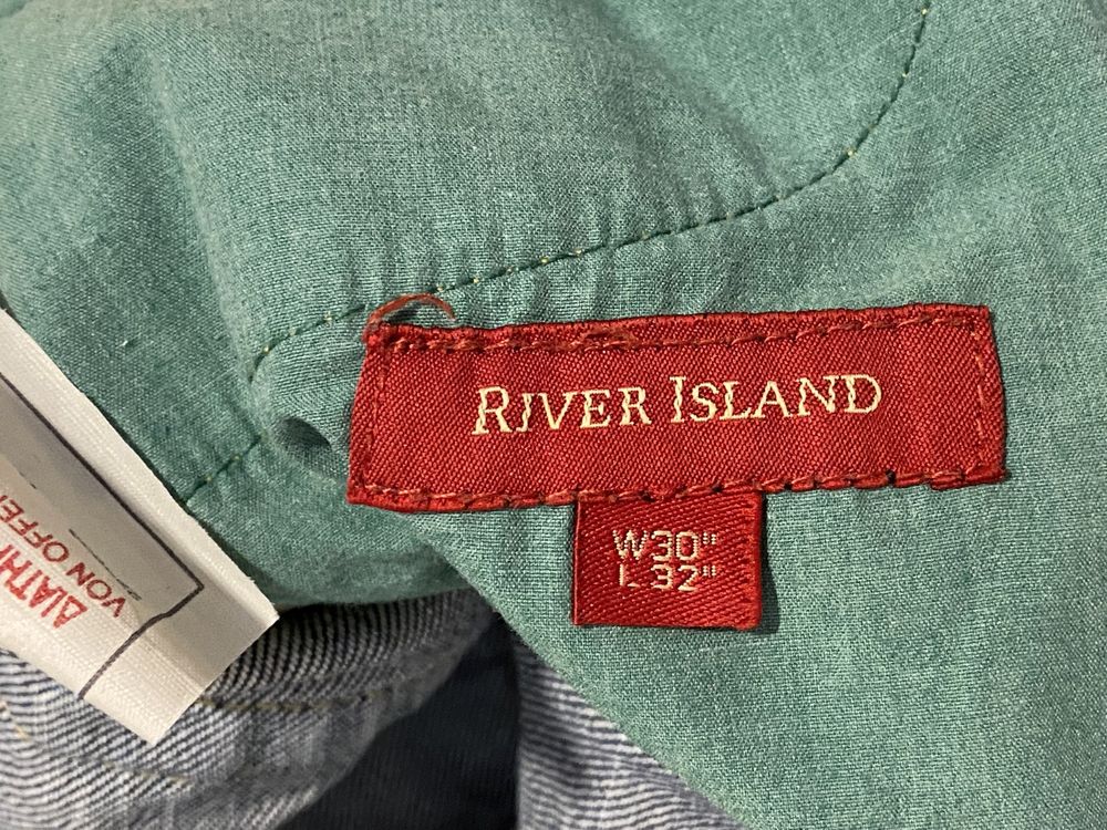 River Island W 30 L 32 niebieskie spodnie  jeasny dżinsy logowane z pr
