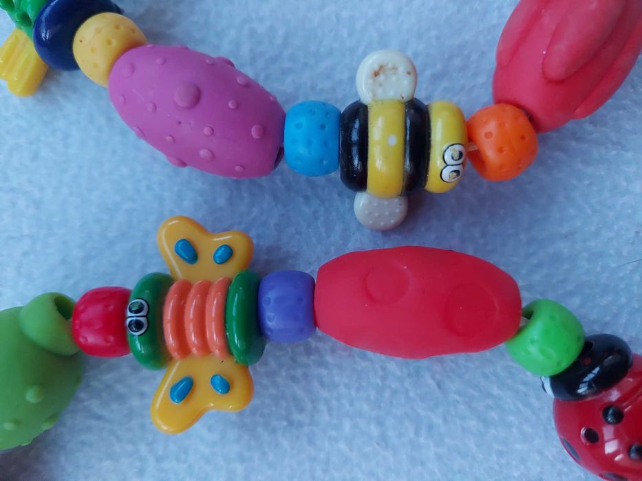 Успокаивающий прорезыватель Nuby Bug-a-Loop Teether 3 +