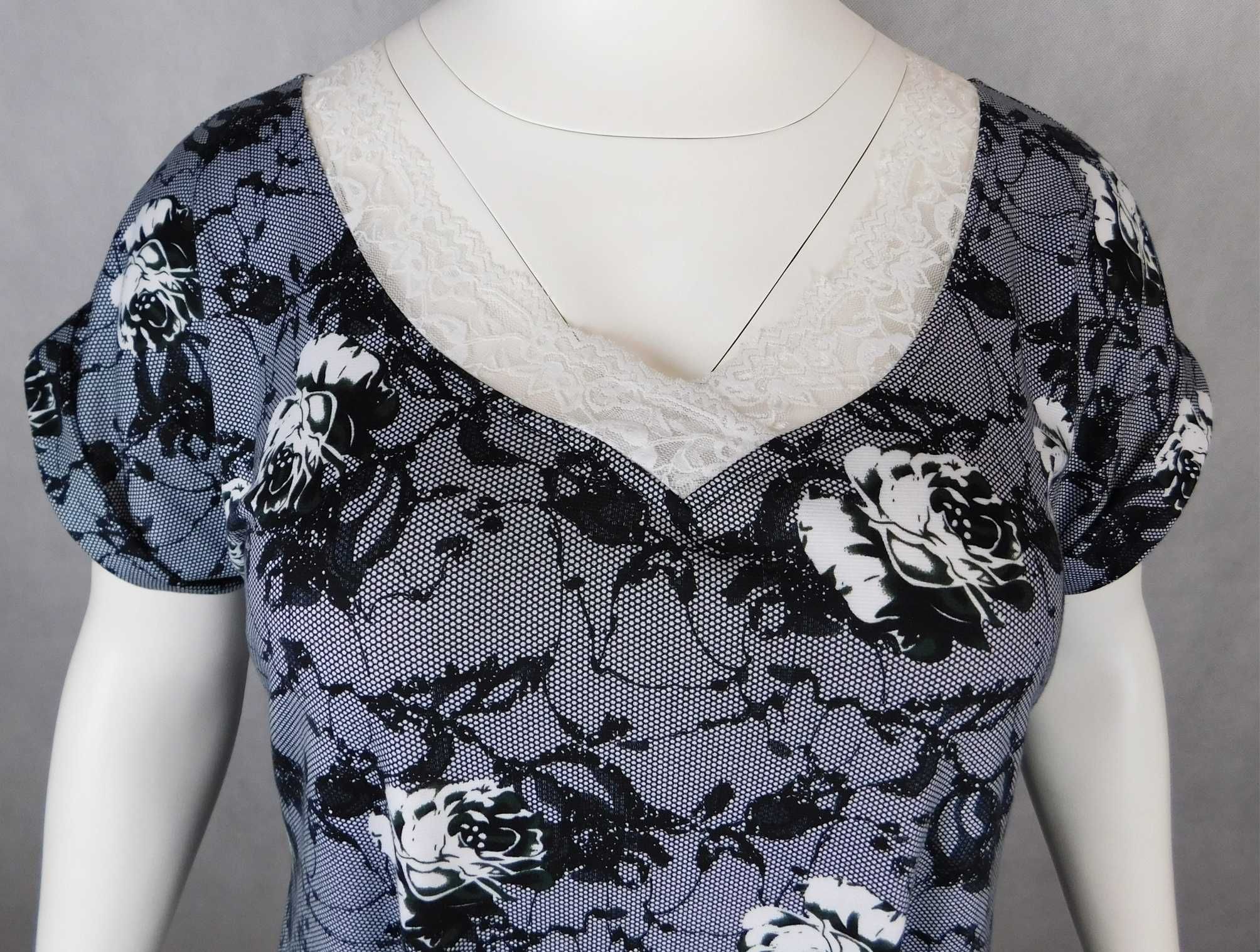Sukienka elegancka z kieszeniami imitacja koronki XXXL - 60/62