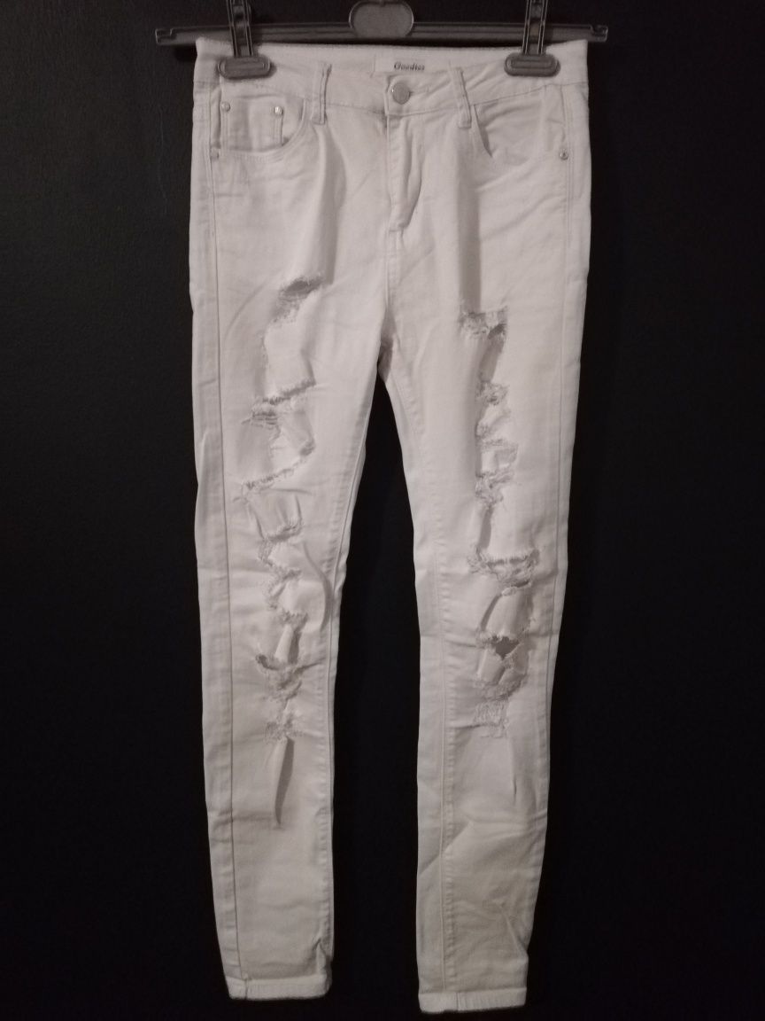 Spodnie białe dziury szarpane