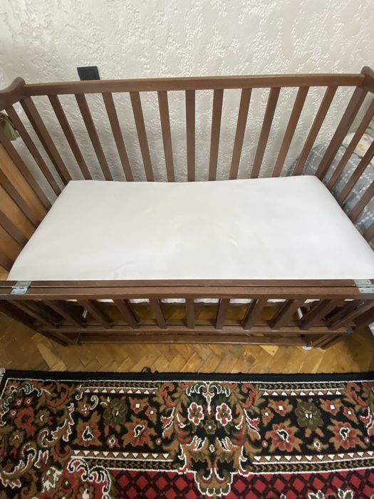 Дитяче ліжечко з матрасом та бортиками