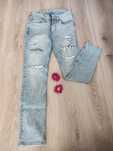 Jeansy przetarte dziury niebieskie H&M prosta nogawka 31/170cm