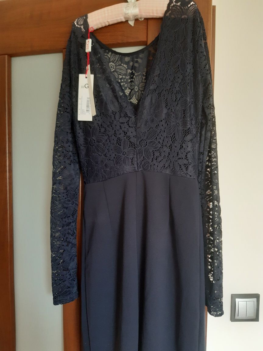 Nowa ołówkowa sukienka midi roz. 34