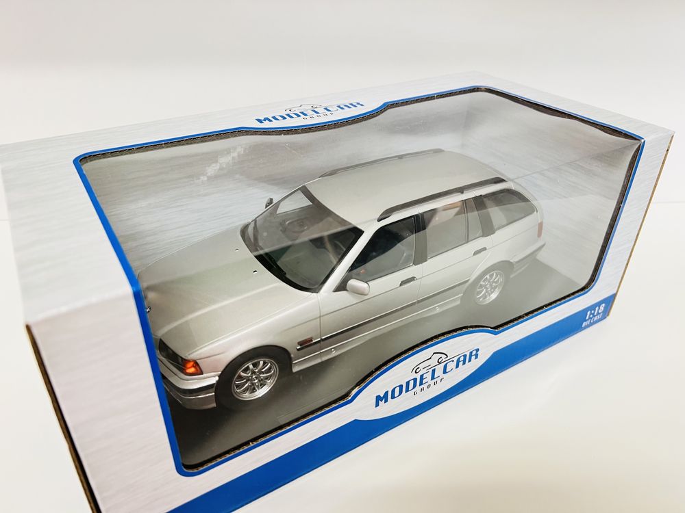 BMW 325 Touring E36 srebrny MCG 1/18