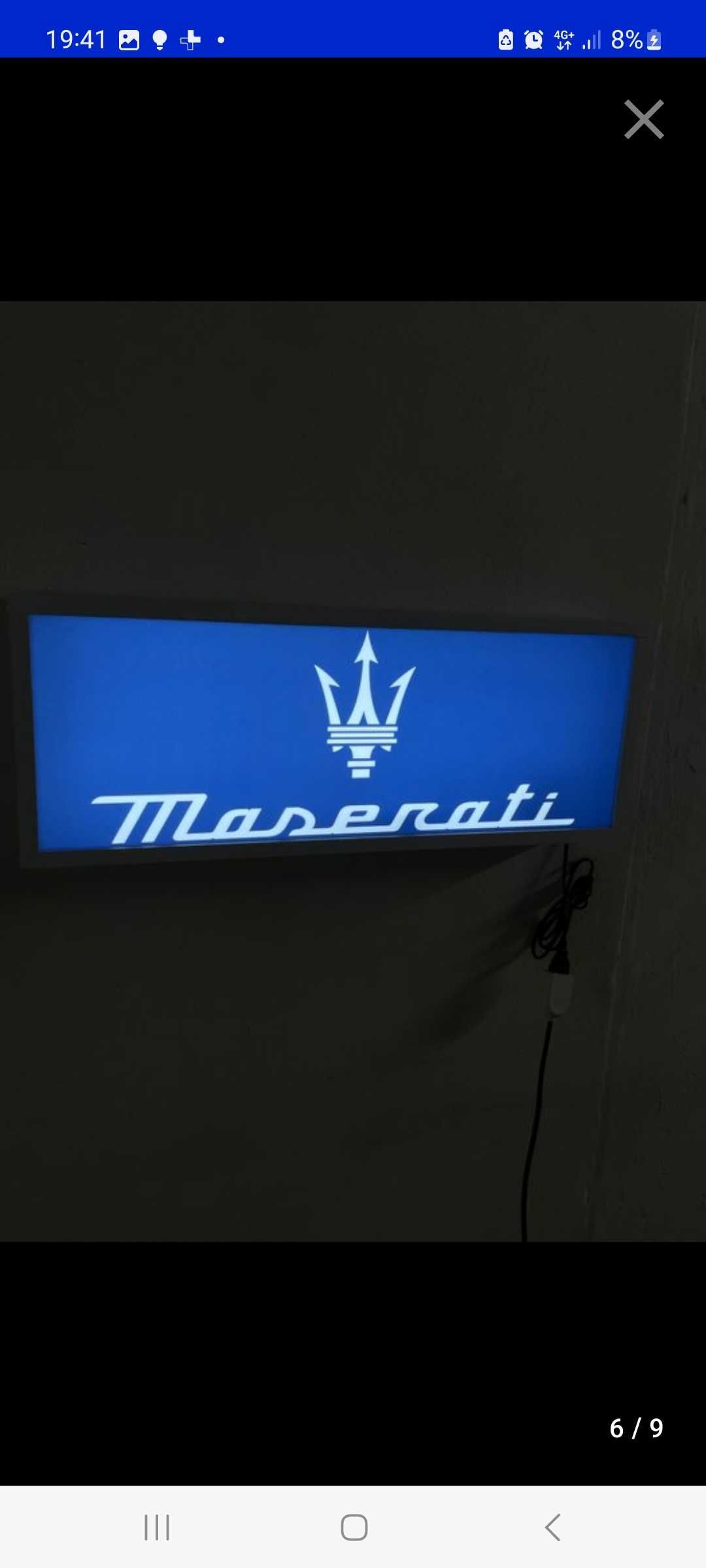 Sinal luminoso maserati