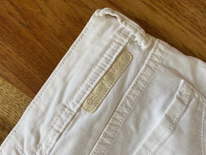 Calvin klein biale spodnie rurki skinny basic capsule xs s 34 36