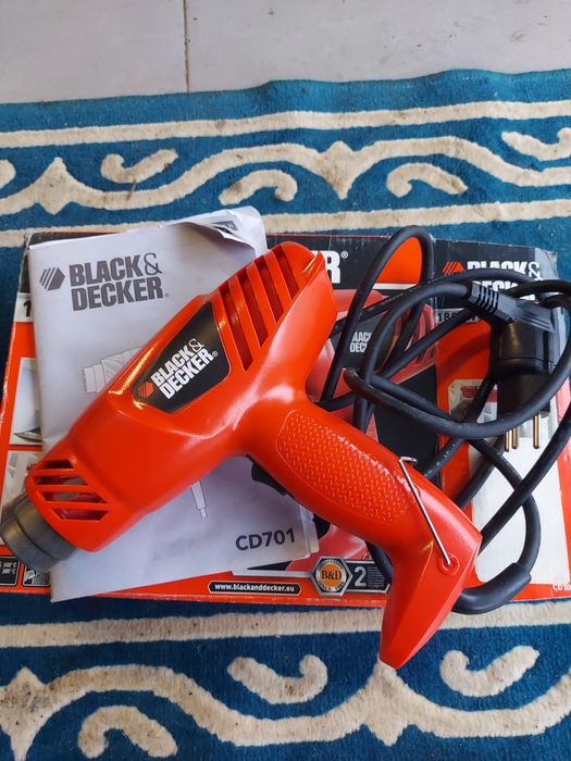 Pistola de ar quente.