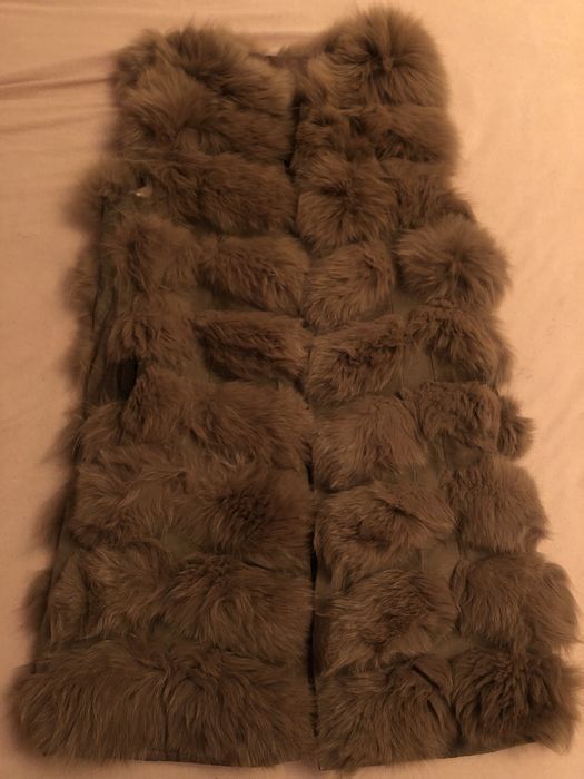 Меховая жилетка