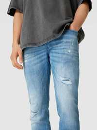 Jack & Jones
Jeansy o kroju slim fit z 5 kieszeniami model ‘BLAIR’