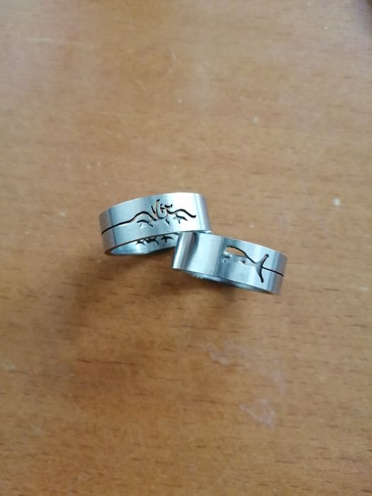 Anéis e pulseira em aco