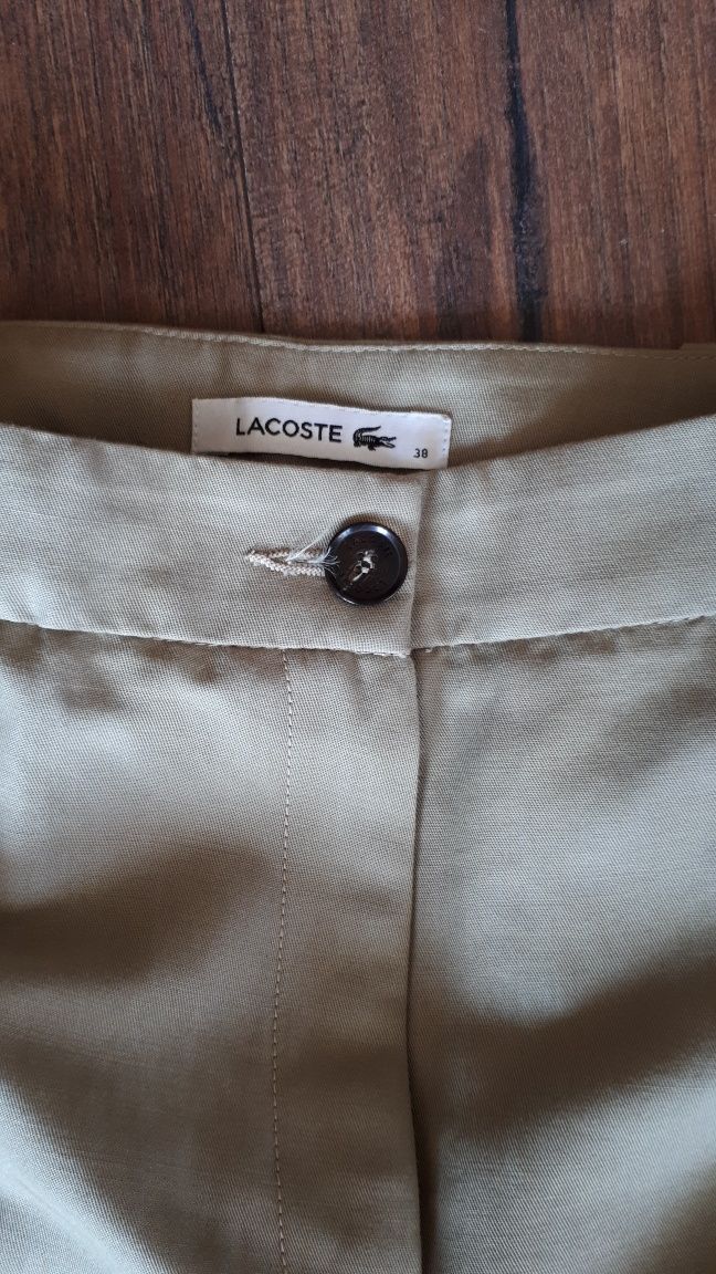 Spodnie eleganckie beżowe Lacoste rozmiar M