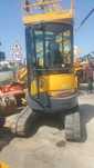 Mini giratória com manobrador