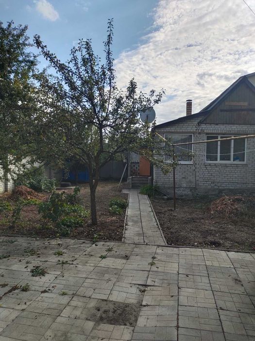 Продам часть дома Песочин (ул. Майская, санузел в доме, есть гараж)