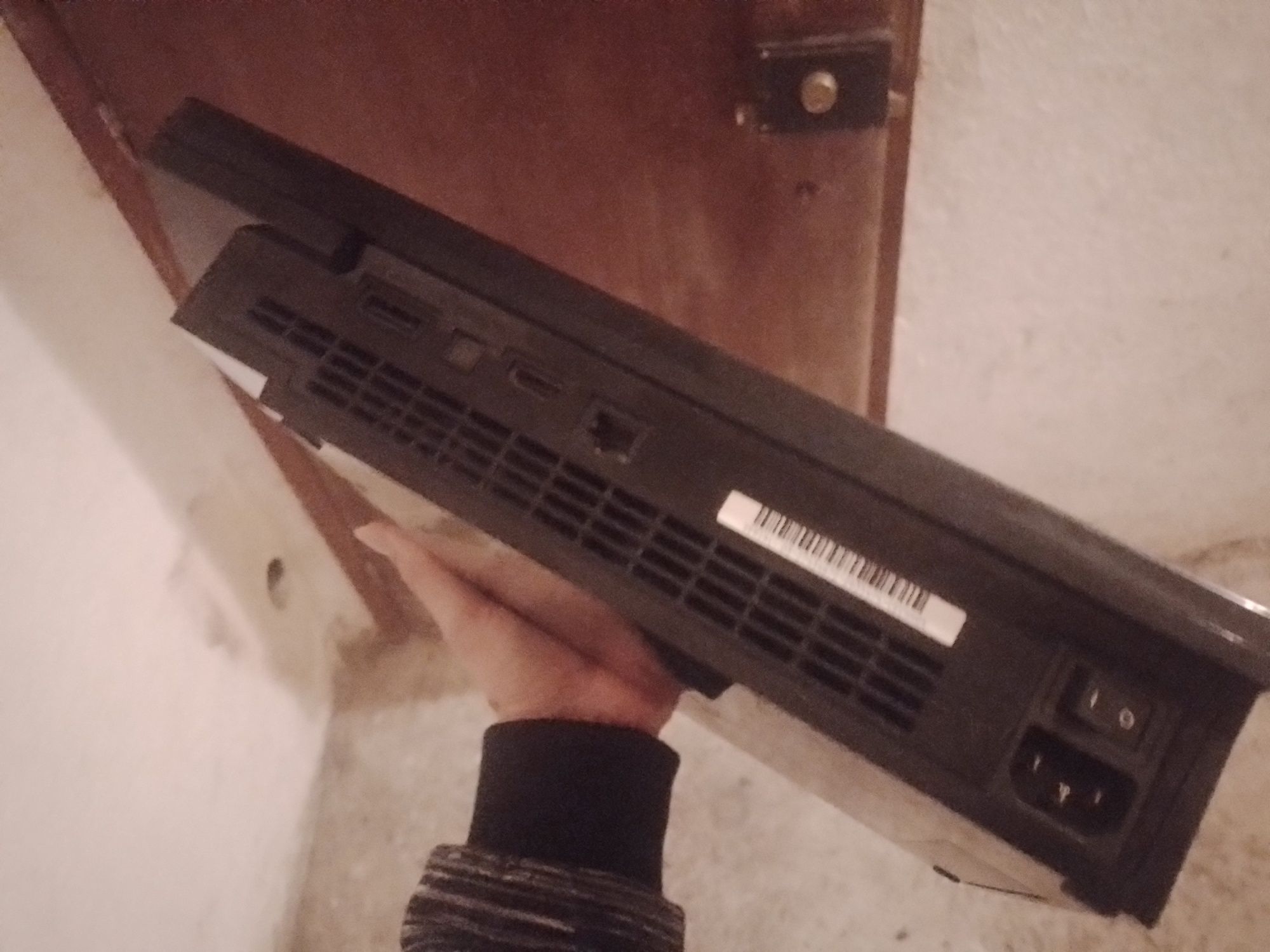 PS3 com 2 comandos e 2 jogos