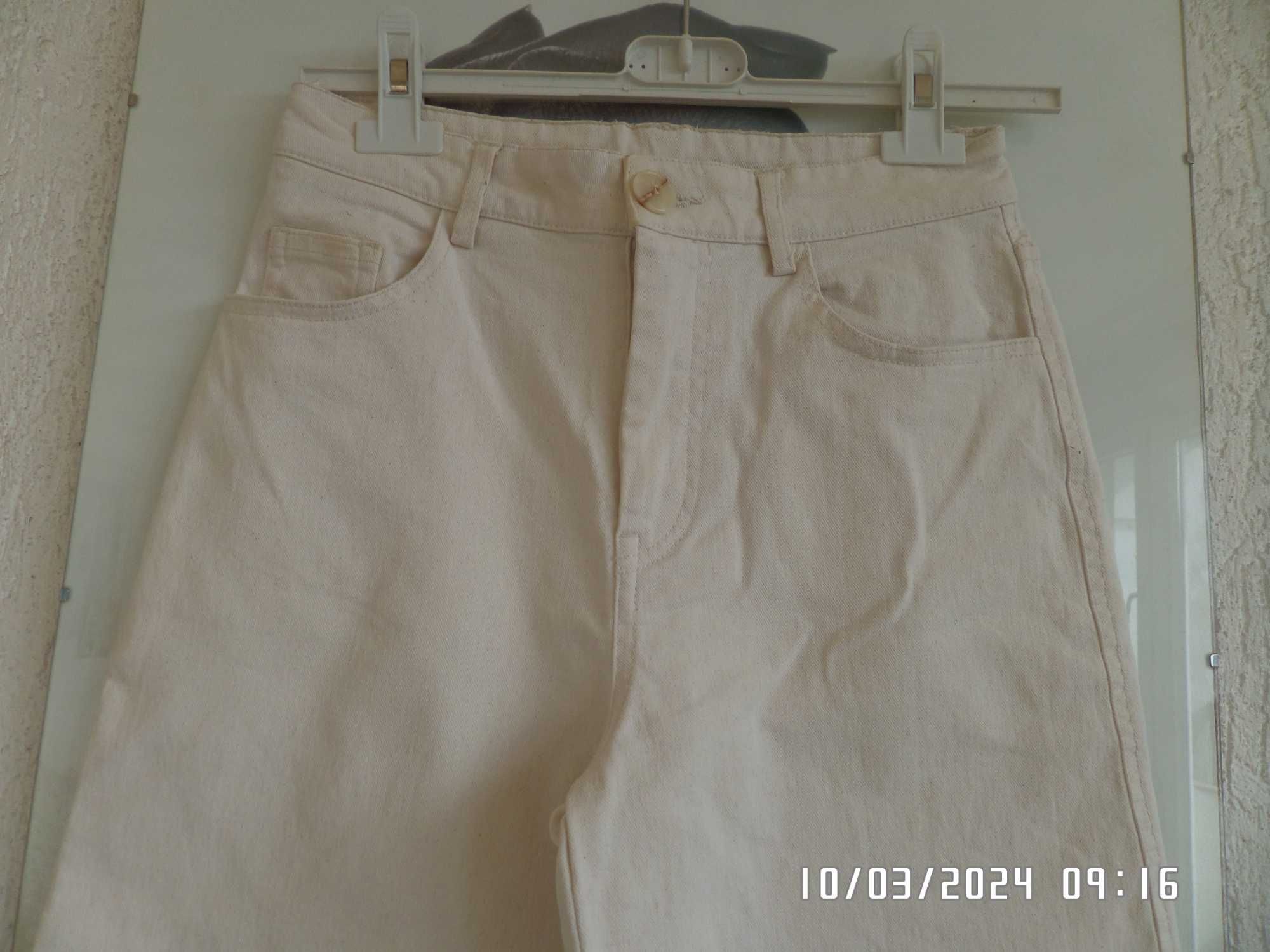 Hit sezonu .H&M szerokie nogawki  spodnie jeansy   creme x/s