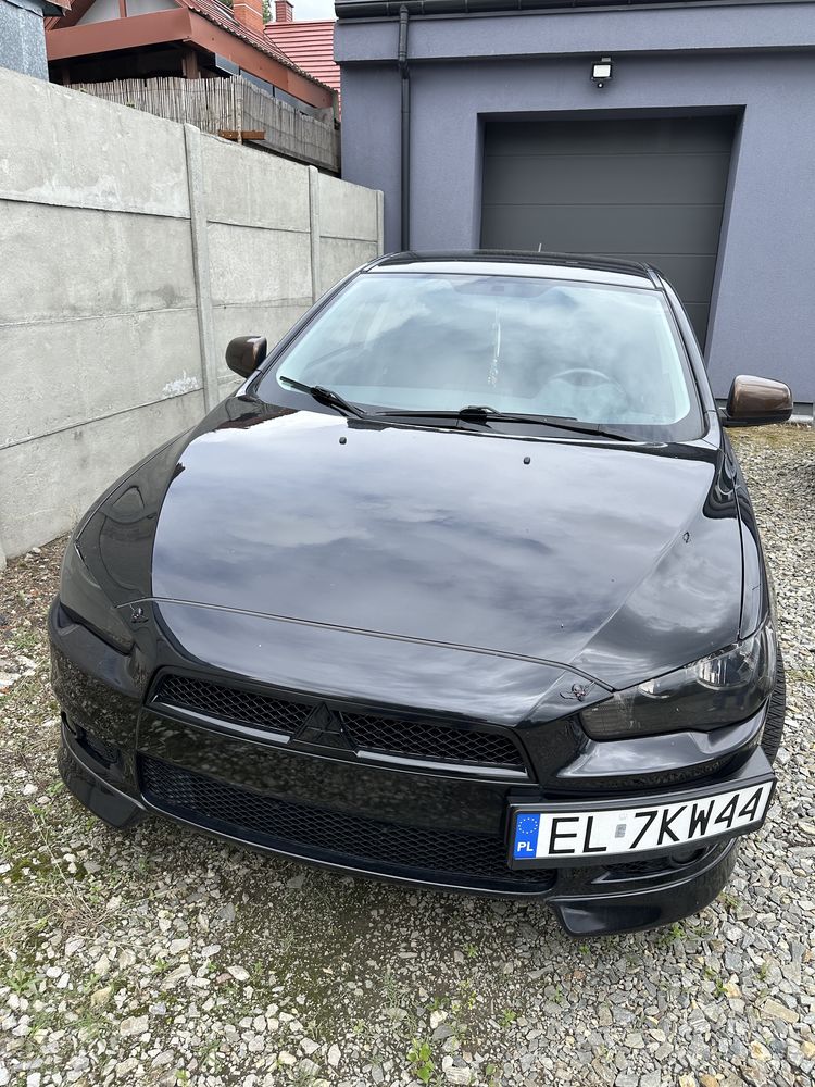 Mitsubishi Lancer 2012 oszczędny zrobiony na styl EVO przebieg 63771km