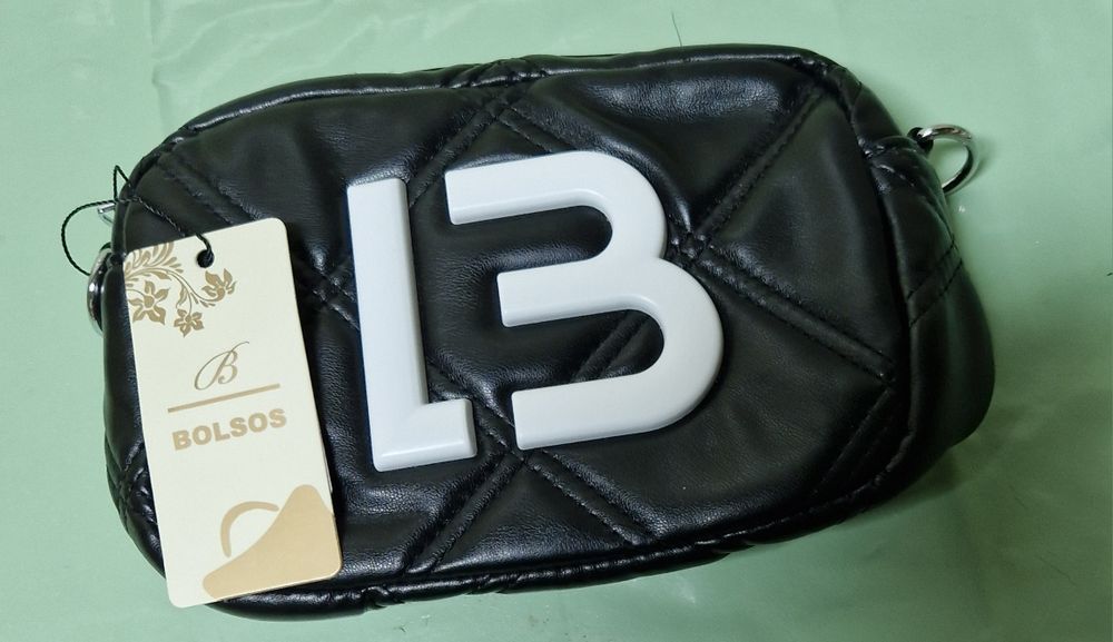 Malas e carteira nova