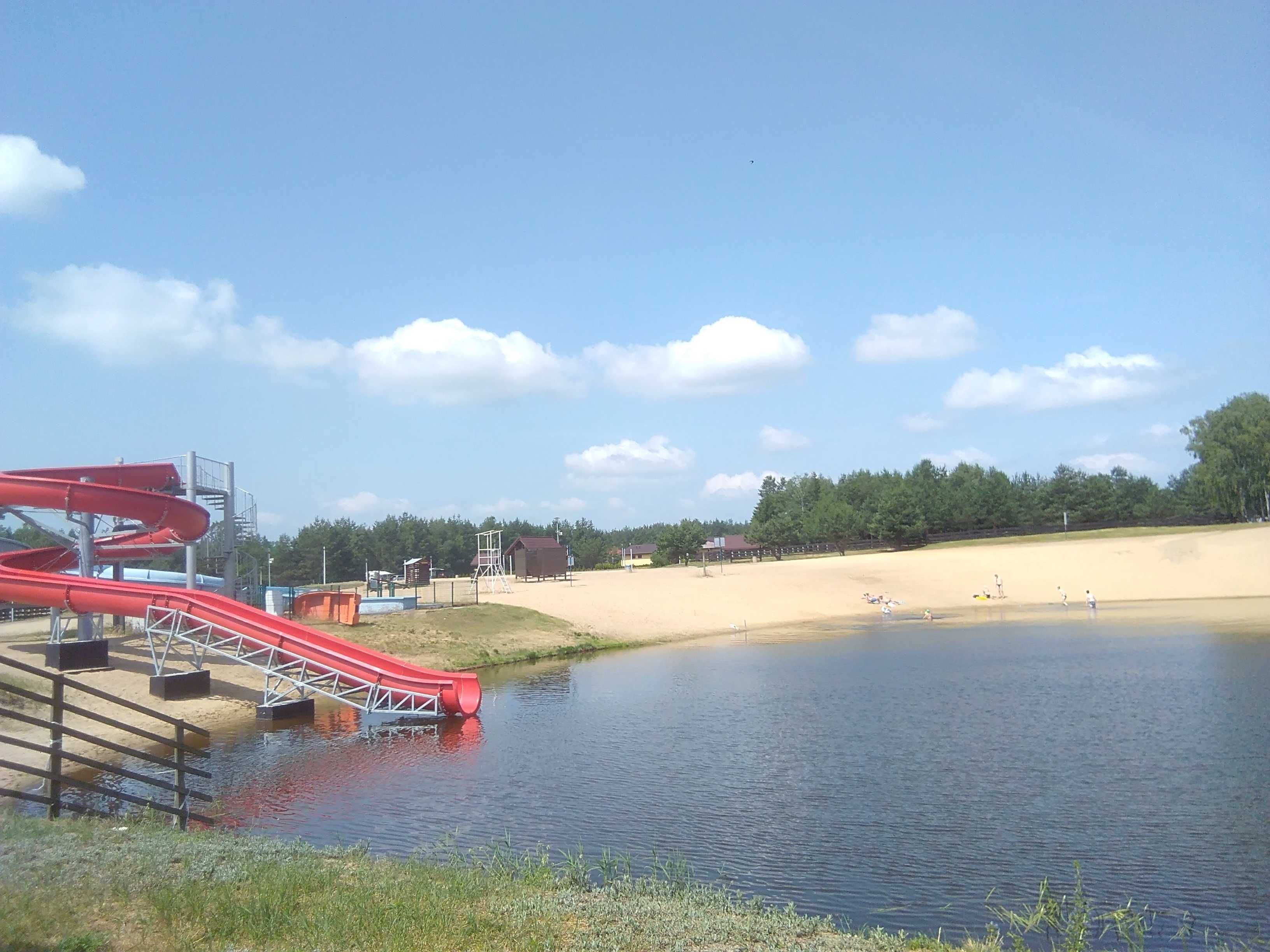 Domek nad zalewem, ogrodzona działka 1100m2.