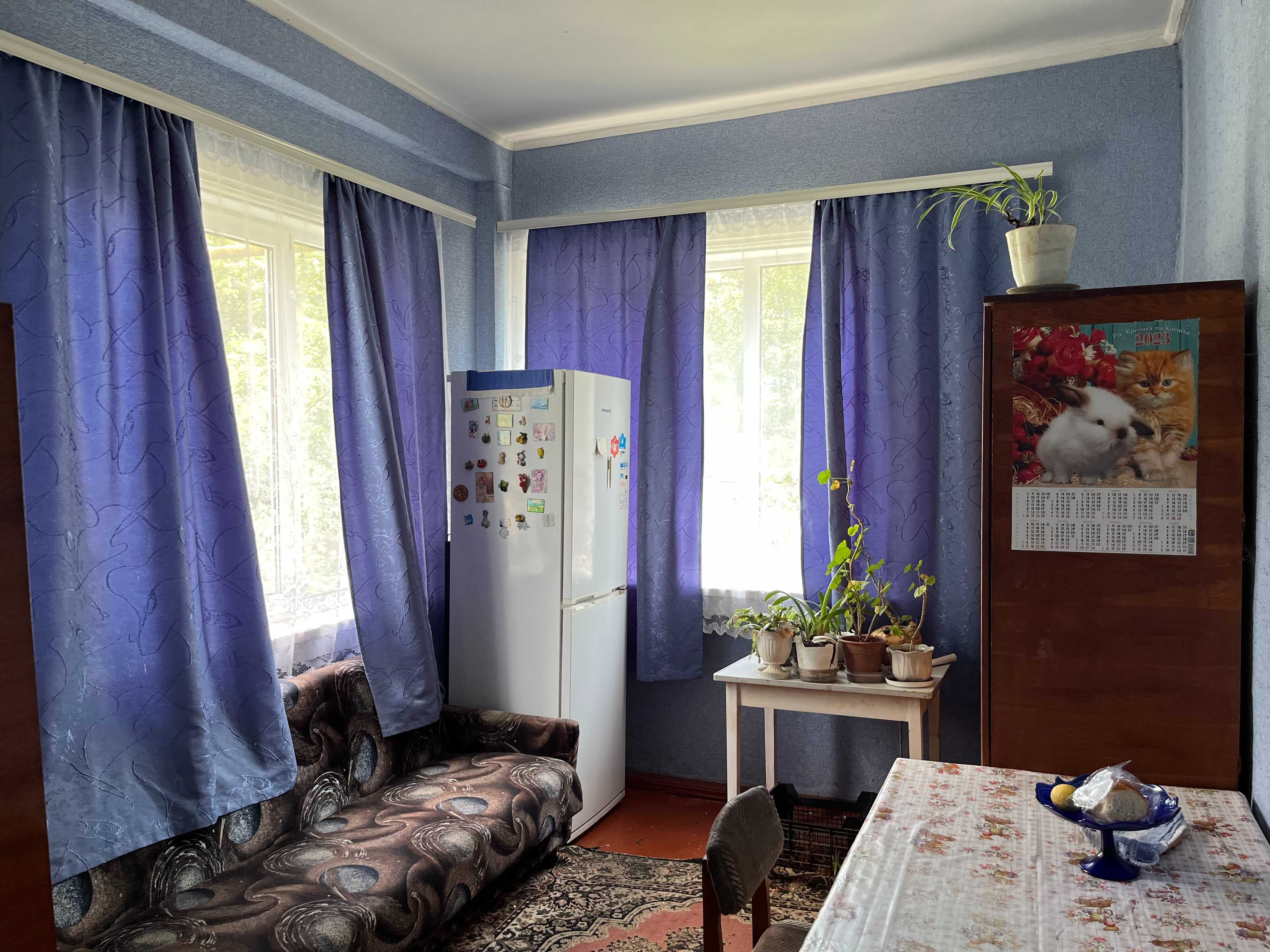 Продам півбудинку,р-н"Порт",вул.Успенсько-Троїцька
