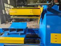 Rozwijak do blachy hydrauliczny 6 ton z wózkiem podawczym