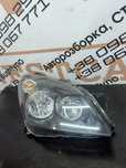 Фара передня права правая HELLA Opel Astra H 1EG27037002 оригінал