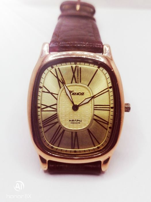 Золотые часы Ника