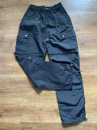 Czarne spodnie ze ściągaczami