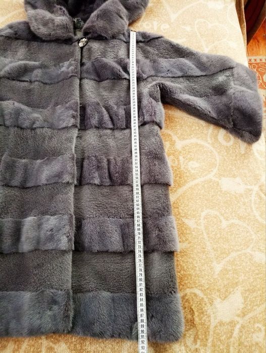 норкові шуби дві