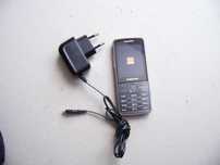 Telefon Samsung GT-S5610 orange +ładowarka