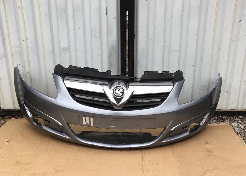 Бампер передній з решіткою радіатора Opel Corsa D 06-10р.
