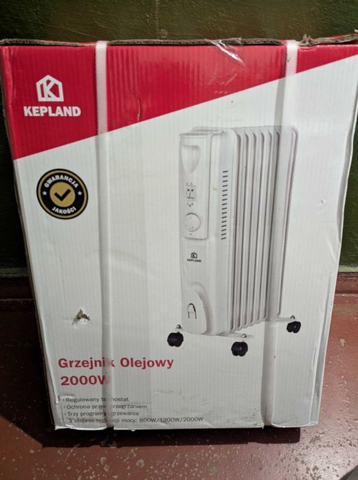 Масляный обігрівач