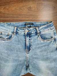 Damskie spodnie jeans 38