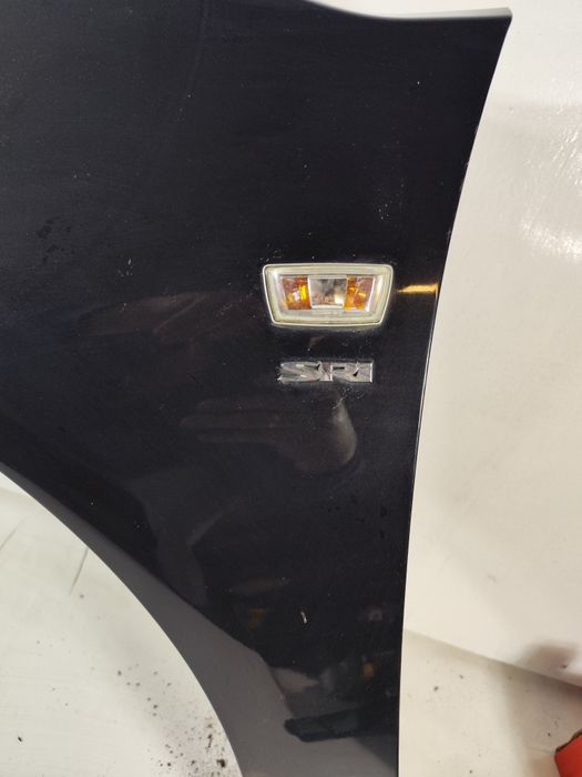 Opel Astra J IV GTC Cascada Lewy Przód Przedni Błotnik Z22C Oryg WLKP